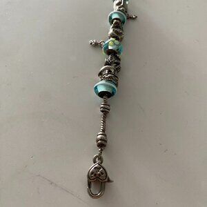 Pandora bracelet with multiple charms